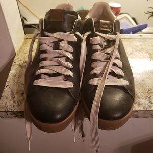 Pair of coach sneakers